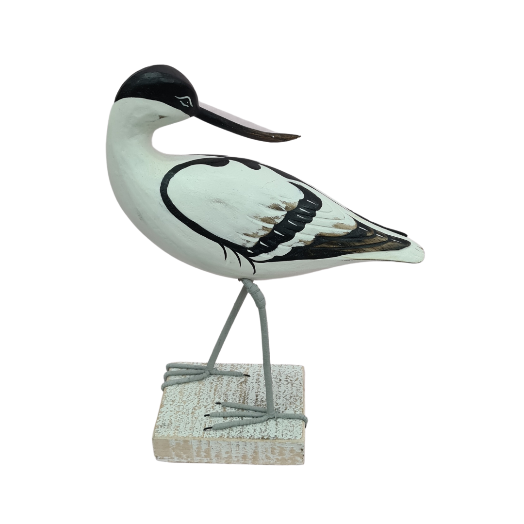 Long billed bird figure preening 30 cm high
