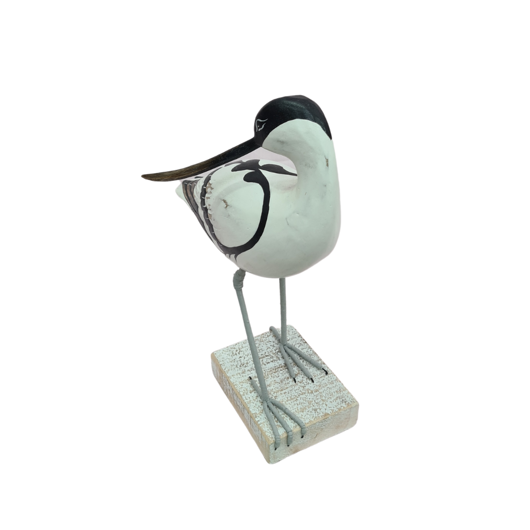 Long billed bird figure preening 30 cm high