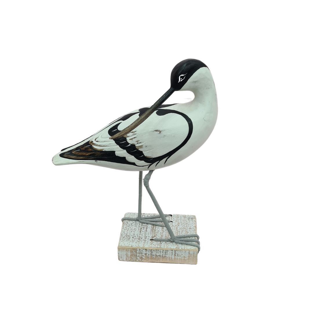 Long billed bird figure preening 30 cm high