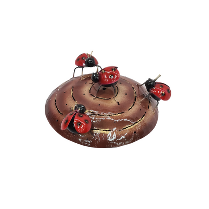 Red bugs on a brown mosquito coil holder