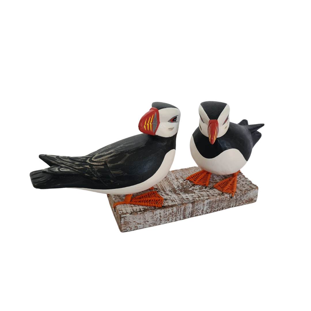 Puffin pair standing on log 38 cm long