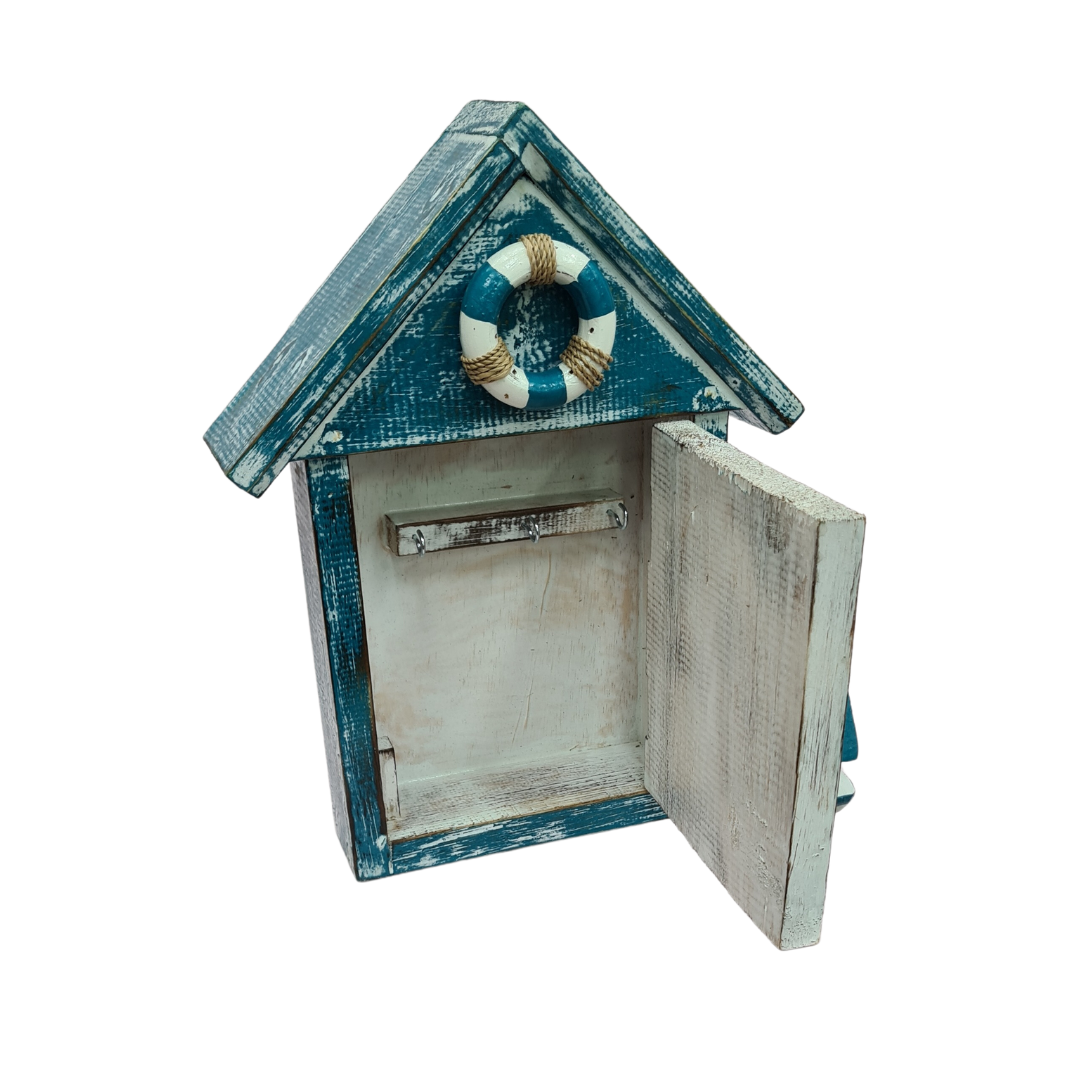 Key storage box shaped as a beach house with a door and 3 hooks