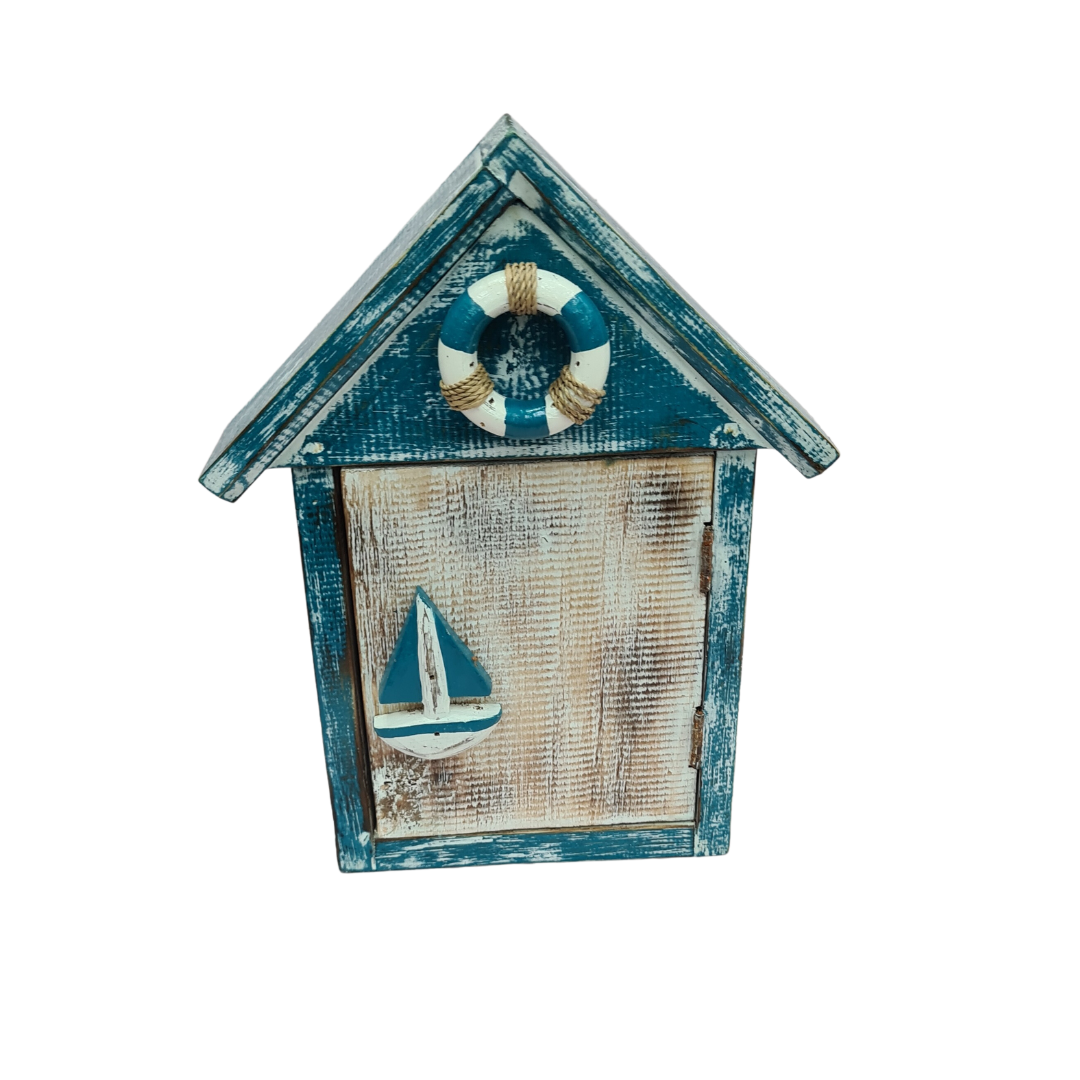 Key storage box shaped as a beach house with a door and 3 hooks