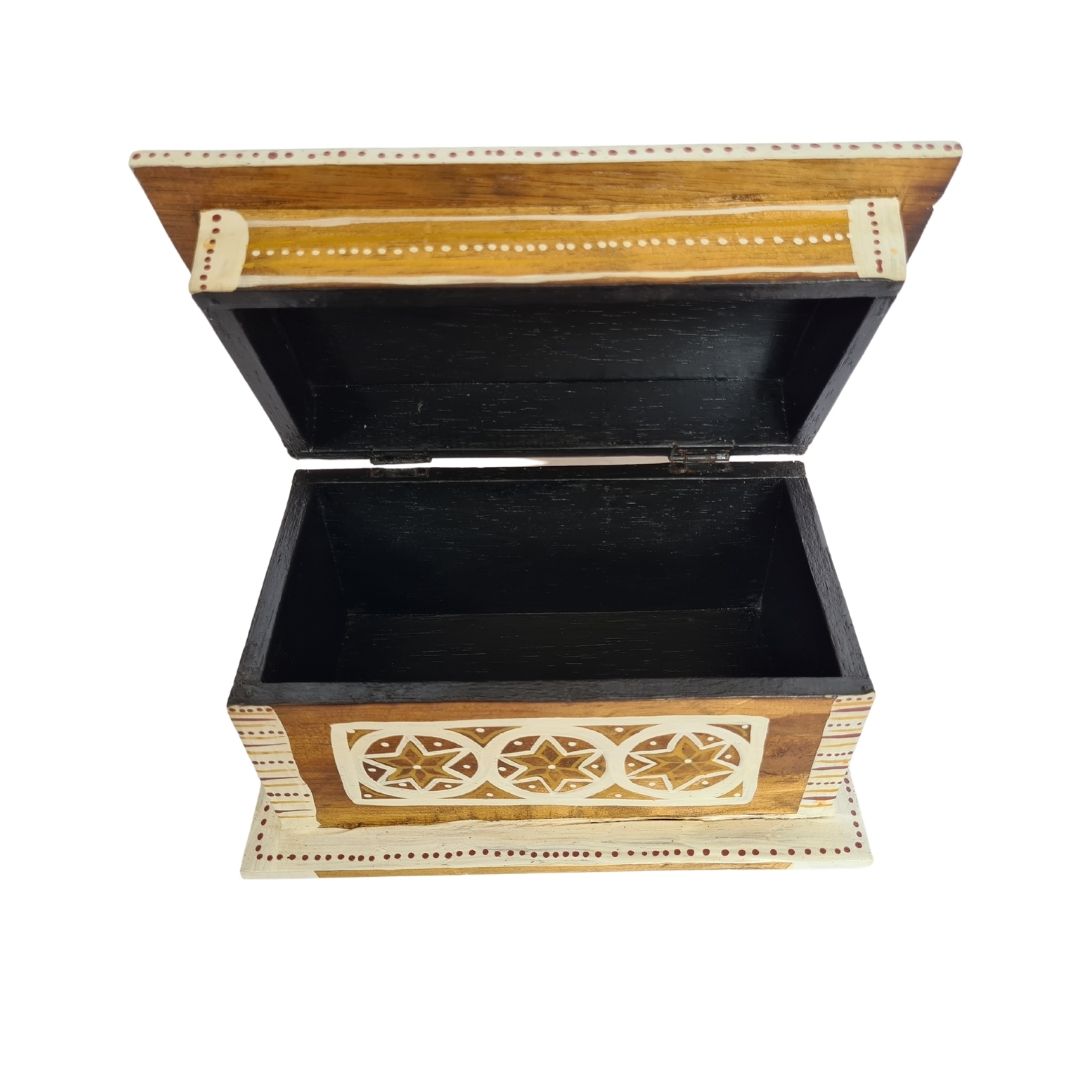 wooden box with star pained details open